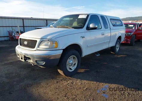 2000 Ford F-150 Lariat/Work Series/Xl/Xlt z USA, uszkodzony, nr VIN 1FTRX18LXYNA80073